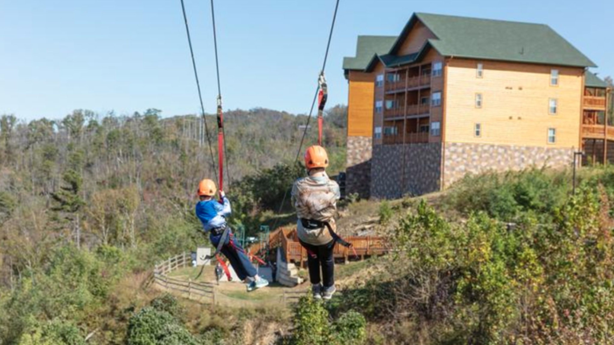 male and female, ziplining in the smoky mountains, gatlinburg tn