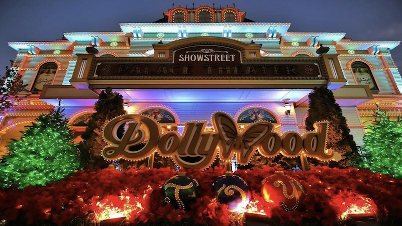 Dollywood sign with Christmas decor at night