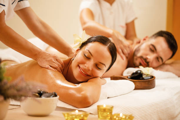 spouses receiving a couples massage