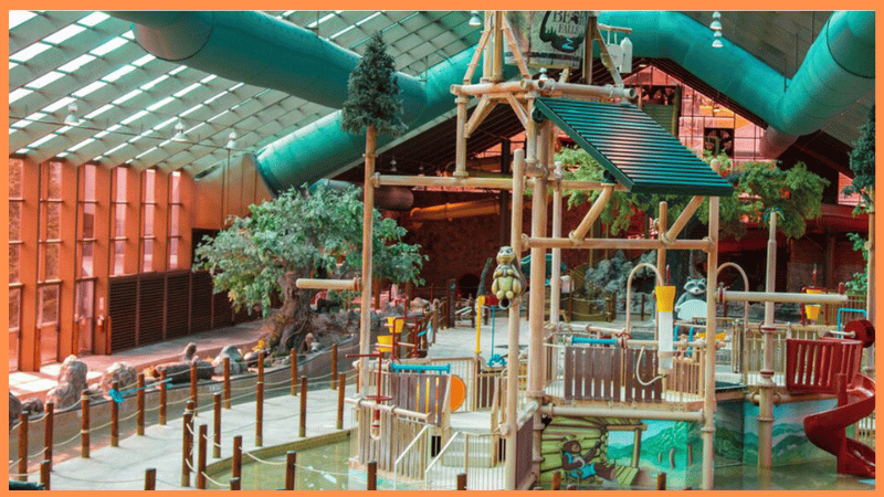 aerial view of wild bear falls indoor waterpark with orange borders